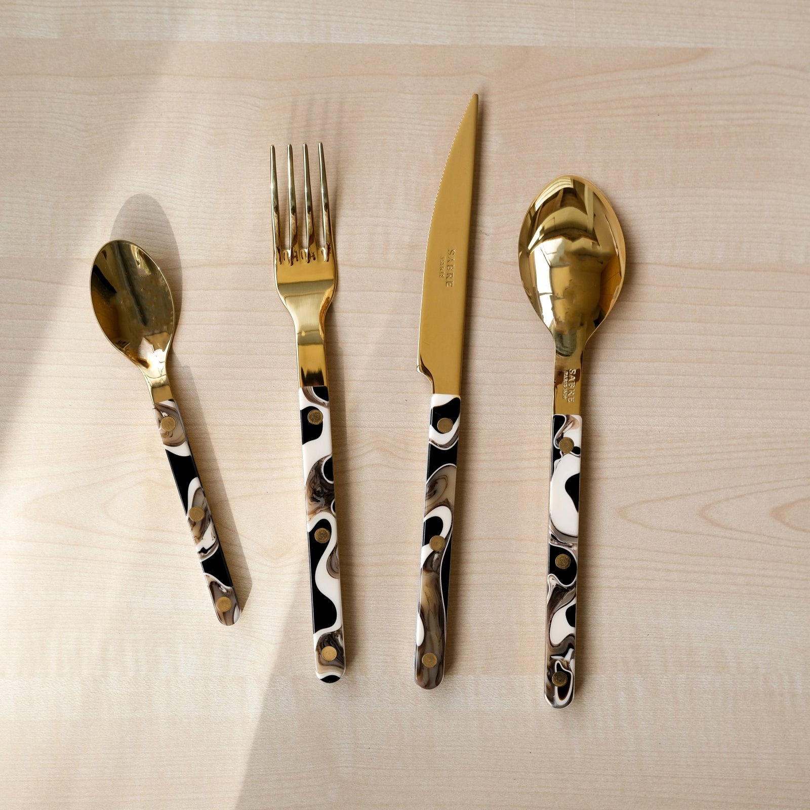 Bistrot Gold Dune, Dune Black - 4 pieces cutlery set